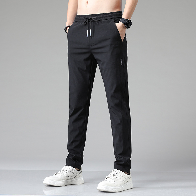 Pantalones casuales de hielo delgados de verano transfronterizos elásticos delgados de hombre 2026 nuevos pantalones deportivos de secado rápido