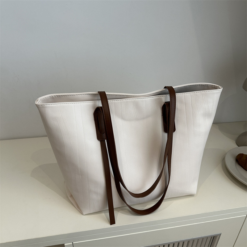 Bolso de gran capacidad para mujeres 2024 nuevo bolso de mano de textura retro bolso de hombro de viaje de mujer bolsa de oficina