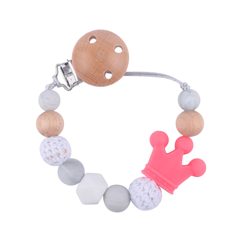 Suministros para bebés calmante clip de chupete de haya bebé anti-caída de la cadena de dibujos animados corona de silicona perlas mordedura molar chupete cadena