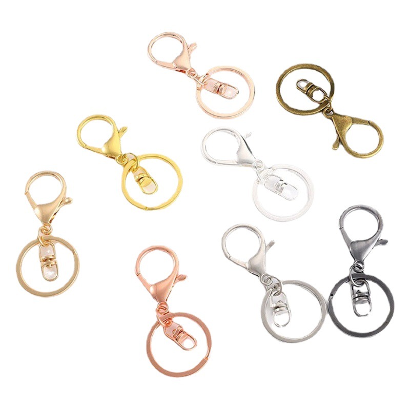 DIY accesorios de la joyería de metal de langosta hebilla de sellado de aceite de galvanoplastia de color de retención de tres piezas con llavero colgante de ocho palabras Accesorios