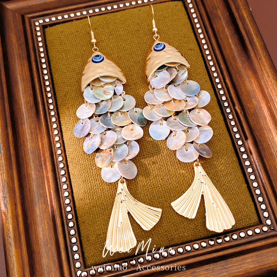Medieval vintage concha de pez gancho de orejas frillones personalidad temperamento pendientes retro lujoso ligero de alto nivel sensación de orejas para mujeres
