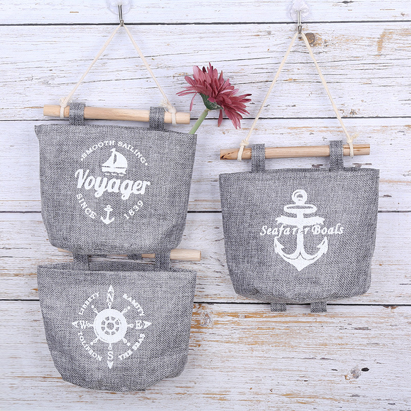 Comercio exterior transfronterizo creativo simple algodón Lino misceláneas bolsa de almacenamiento bolsa colgante almacenamiento en el hogar bolsa colgante tela cesta colgante fabricante