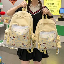 新款高颜值清新可爱学院风书包小学生轻便通勤百搭卡通印花双肩包