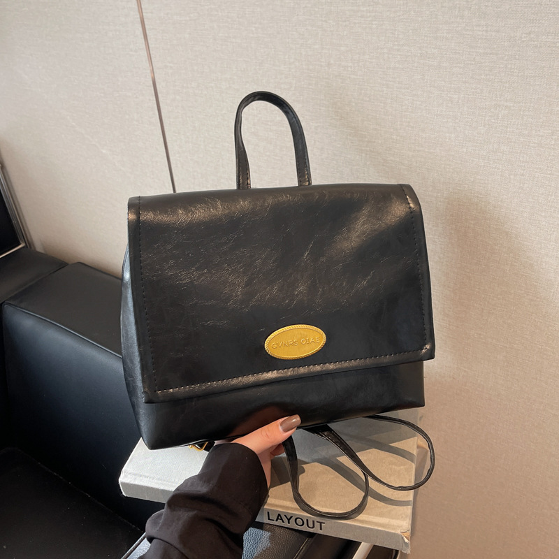 Textura avanzada de invierno de 2024 nueva versión coreana de la mochila retro para estudiantes universitarios mochila ocio