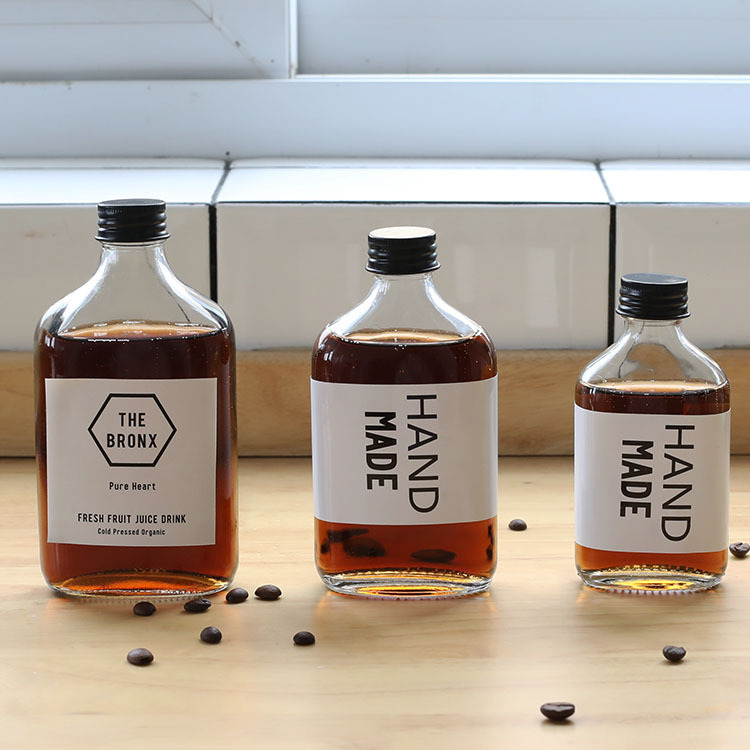 New Small Wine Bottle Glass Cold Extract Coffee Container Transparent Beverage Bottle Fruit Wine Bottle Sealed Glass Bottle Printed logo New Small Wine Bottle Glass Cold Extract Coffee Container Transparent Beverage Bottle Fruit Wine Bottle Sealed Glass Bottle Printed logo