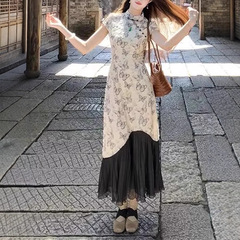 蝶の羽の新しい中国式の蝶のプリントの偽の2つの改良のチャイナドレスの女性の春夏のつなぎ合わせのワンピースの復古はやせている気質を現します。