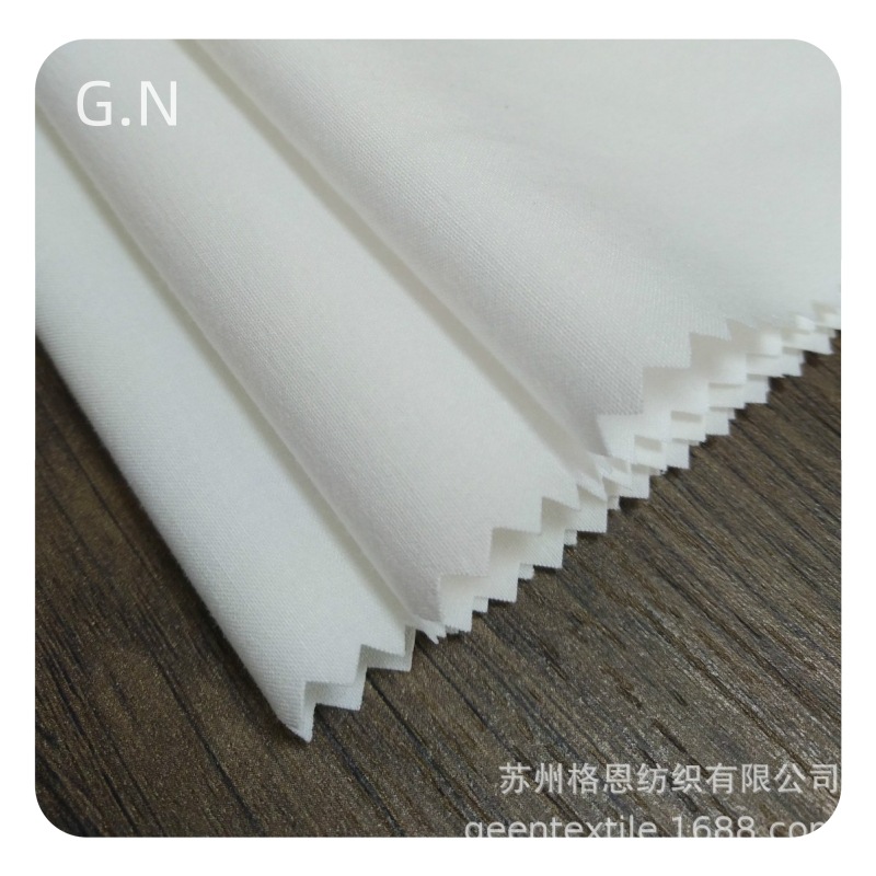 涤棉四面弹白色现货 数码印花底布 沙滩裤吸湿速干面料 176克