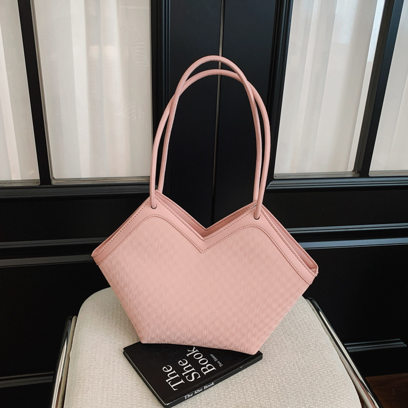 Nicho transfronterizo bolsas de diseño casual para mujeres 2026 nueva moda diaria de verano de gran capacidad de viaje a la axila bolsa de mano