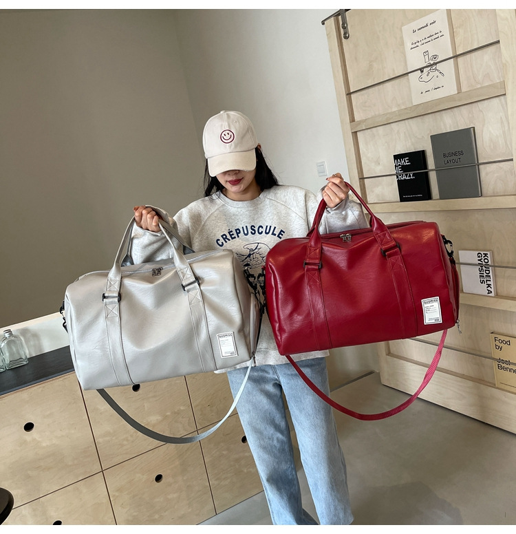 Men's high-end travel bag, large-capacity sports and fitness bag, women's leather travel clothes, luggage bag for men Item Picture