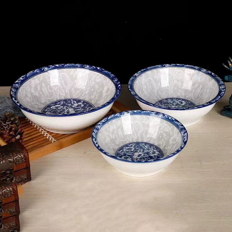 Comercio electrónico al por mayor de impresión verde cuencos y platos de cerámica se adaptan a las necesidades diarias vajilla de porcelana azul y blanca dos yuanes más que el suministro de la tienda