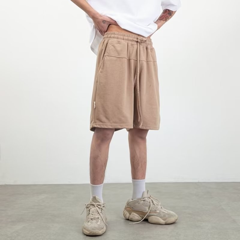 Nuevos pantalones cortos casuales para hombres, marca de moda ins, color sólido, color de contraste simple, pantalones deportivos de cinco puntos colgantes rectos sueltos casuales