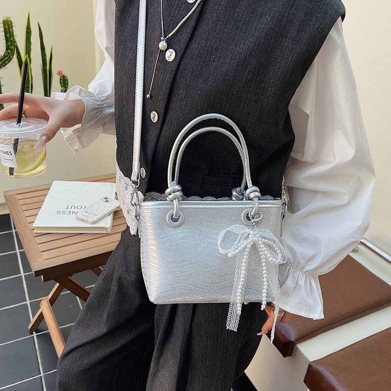 Transfronterizo coreano estilo extranjero simple bolso de cubo 2025 nuevo estilo de transporte de textura bolso de hombro de moda universal bolso de mano