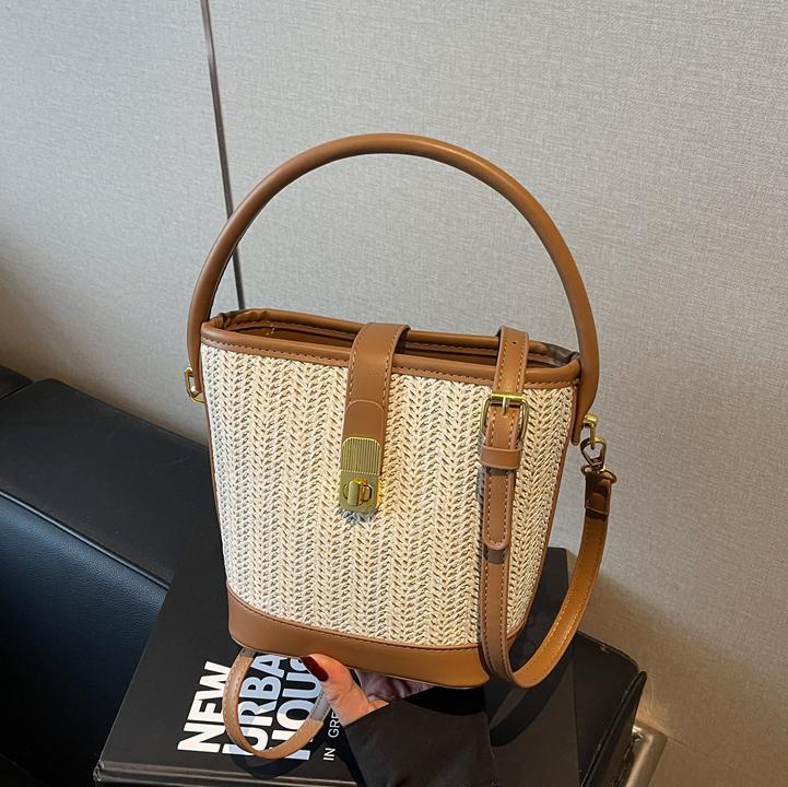 Bolsa de mano de tejido de verano super caliente para mujeres 2025 nuevo bolso de playa de vacaciones de alta calidad bolso de cubo de ocio