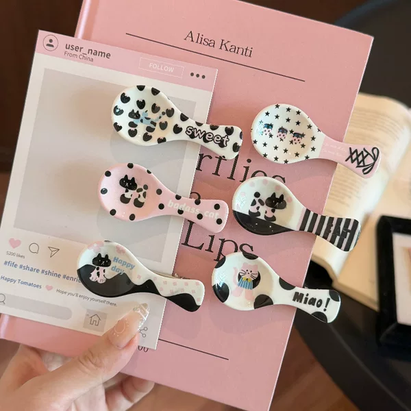New cute cat-shaped spoon hair clips for women, featuring a cartoon design, perfect for securing bangs and side hair