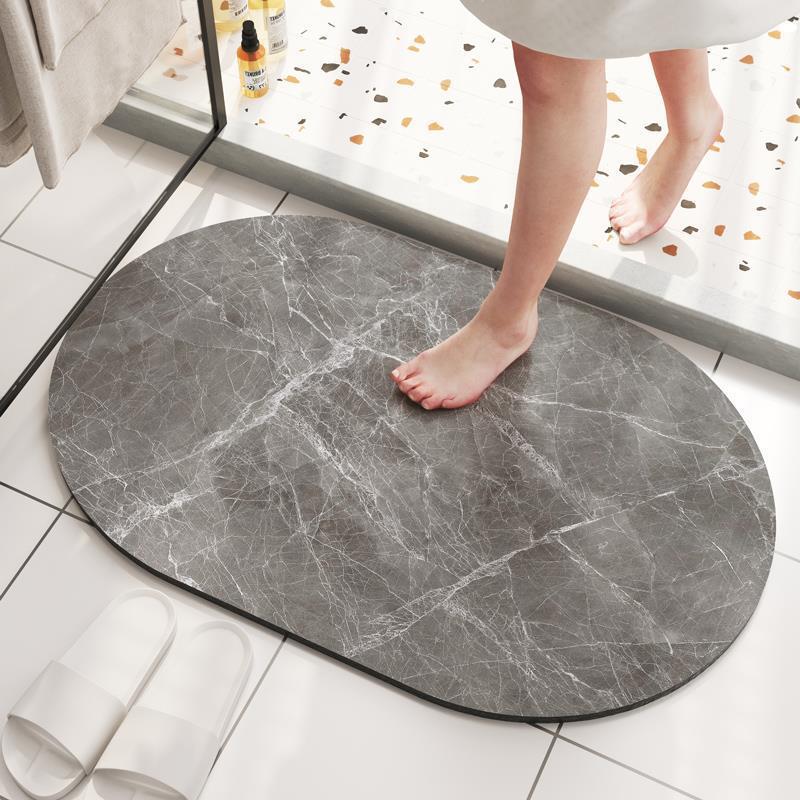 大理石の紋様の浴室の入り口のマットのトイレのじゅうたんの柔らかい珪藻泥の吸水マットの滑り止めの楕円形の足のマット|undefined