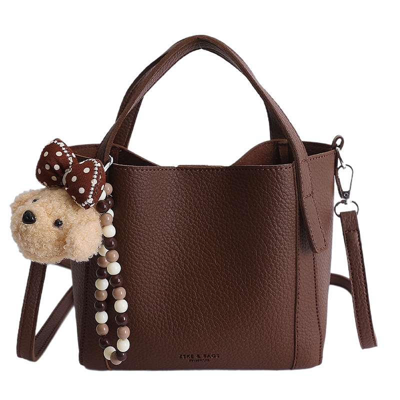 Nicho coreano litchi pattern bolso de cubo de mano mujer comercio exterior nueva moda alta textura ligera lujosa bolsa de mochila