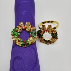 キラキラホテルのアクセサリーのナプキンはクリスマスの花輪の形のナプキンリングの食器のナプキンリングを掛けます。