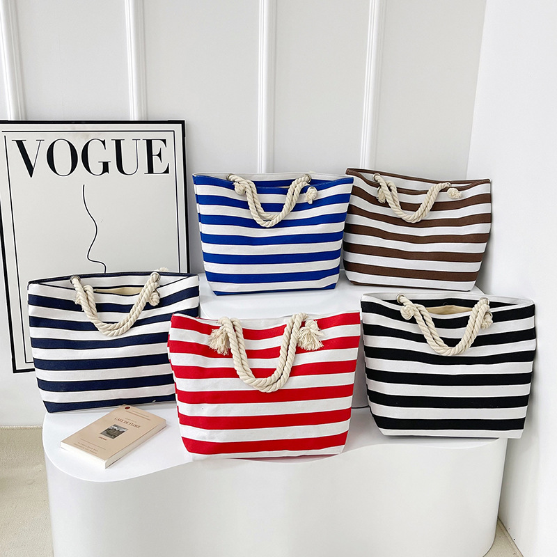 Bolsas de lona a rayas de moda transfronterizas, bolsas de mano japonesas de gran capacidad, bolsas de hombro, bolsas de hombro en stock.