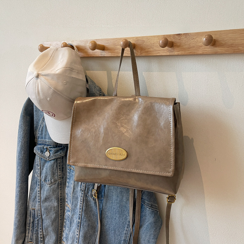 Mochila coreana retro de estilo universitario 2024 invierno nuevo simple de gran capacidad de mano mochila de hombro para viajar