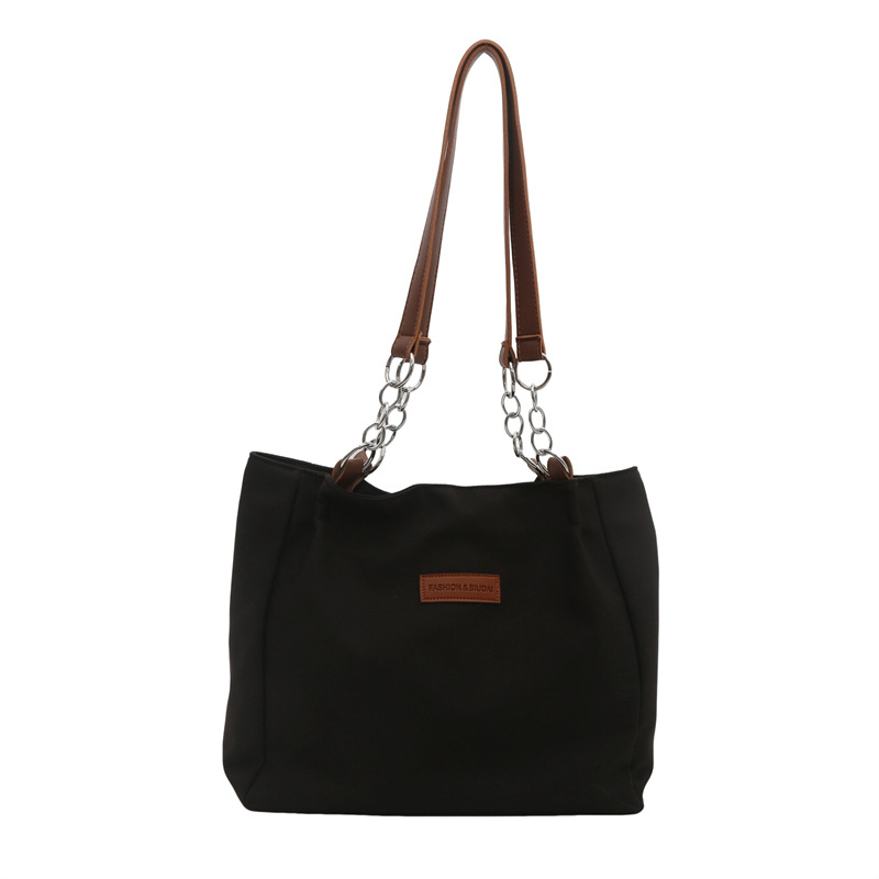 Casual bolsa de viaje de gran capacidad para mujeres 2024 nueva moda bolsa de lona universal bolso de hombro universal bolso simple
