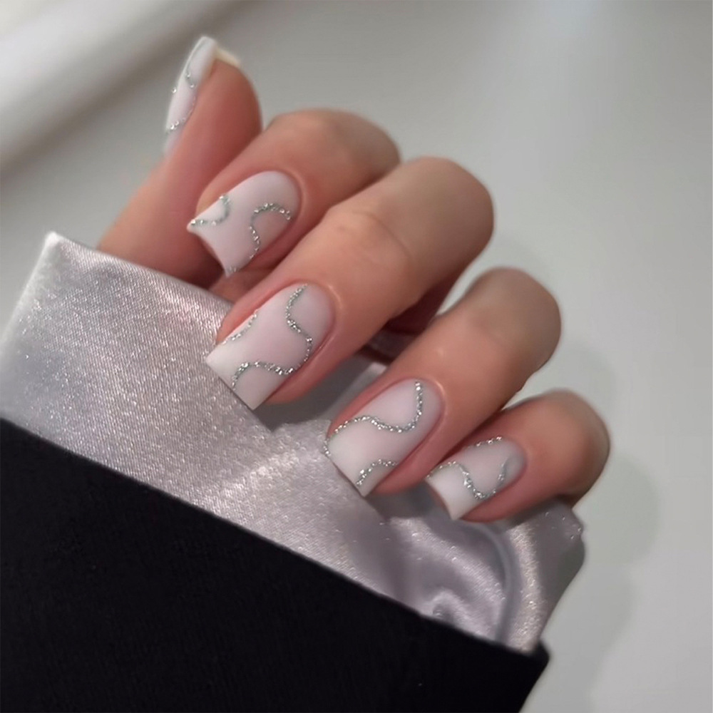 Comercio extranjero venta desnudo polvo de plata líneas brillantes de manicuría dulce suave viento desgaste de uñas 24 piezas de parche de uñas