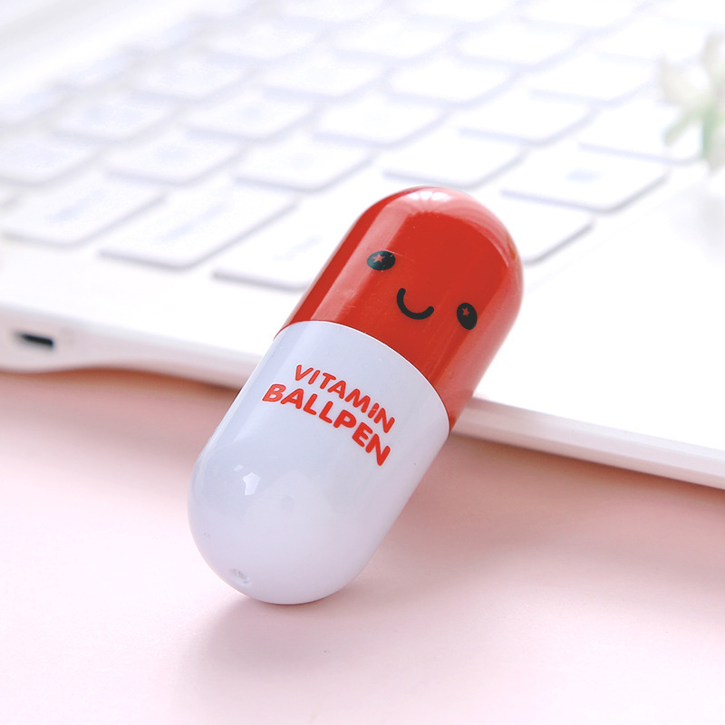Nuevo mini cara sonriente emoji píldora bolígrafo plástico retráctil creativo rompecabezas estudiante papelería regalo al por mayor