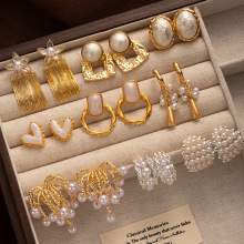 时尚精致925银针珍珠耳环轻奢高级感不规则简约肌理感纹金色耳饰