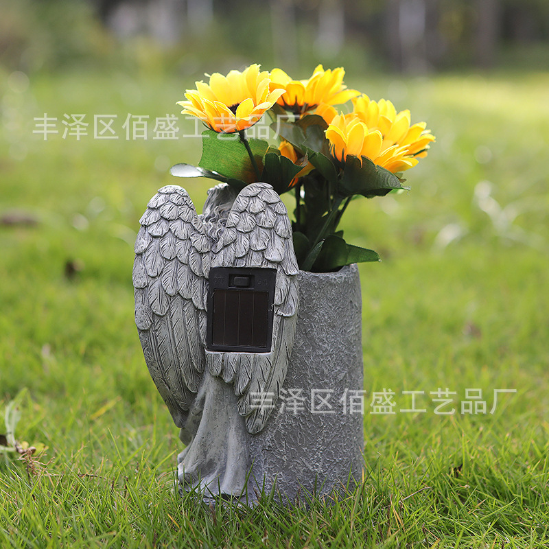 Regalos conmemorativos transfronterizos de resina de piedra imitación cementerio jarrón Angel decoración jardín al aire libre decoración de lámpara solar