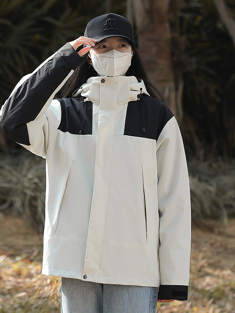 Beijia Mismo estilo primavera y otoño chaqueta impermeable a prueba de viento pareja de hombres al aire libre de una sola capa a juego ropa de montañismo de moda mujer