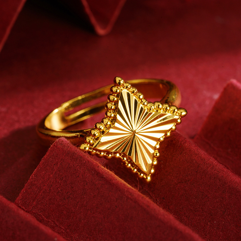 Vietnam oro de arena flores de cuatro estrellas anillo de estriado de ajuste de boca viva dama temperamento de mar China fábrica de viento mayorista