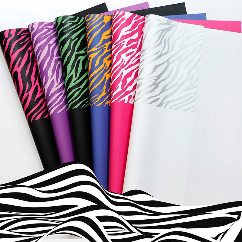 Fábrica de fiestas de flores al por mayor leopardo transfronterizo papel de embalaje de flores nuevo ramo de flores papel de embalaje de regalos florista