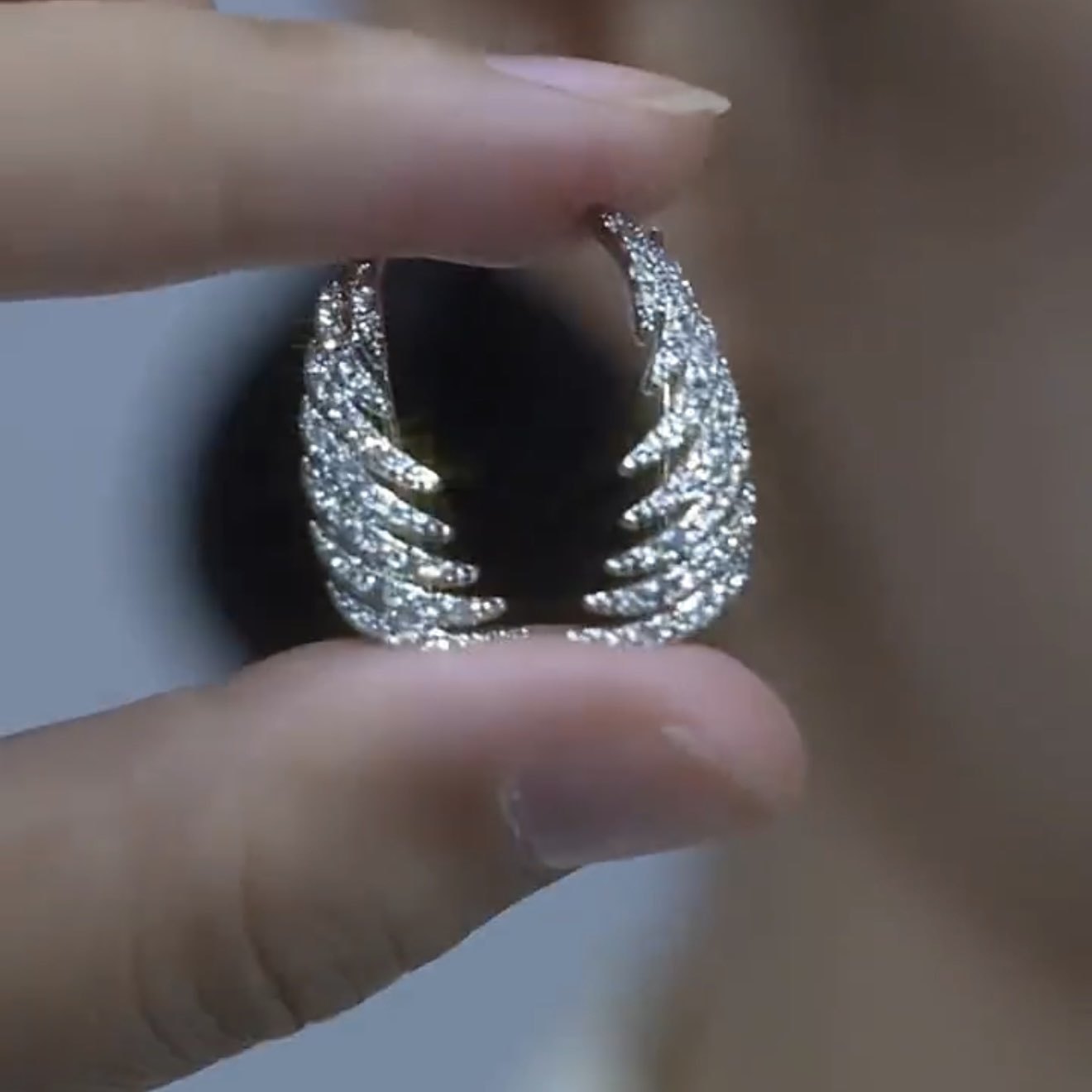 New feather earrings for women, featuring a full diamond setting and intricate feather design, offering a fashionable and sophisticated look