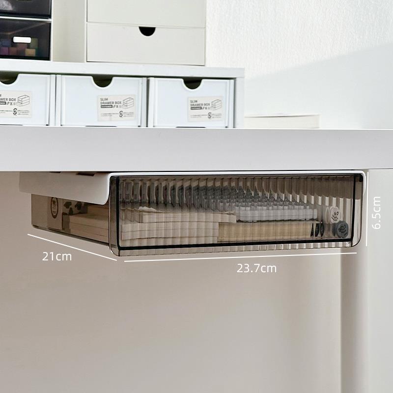 机の下の見えない引き出し式の収納箱のデスクトップの事務室は箱の物を整理して棚の工位の雑物を置いて神器を隠します。|undefined