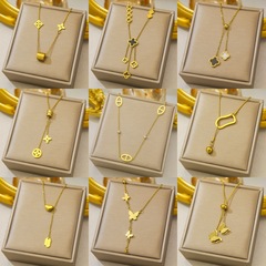 クロスボーダーチタン鋼非退色メッキ 18K リアルゴールドペンダントネックレスファッションライト高級ニッチハイエンド鎖骨チェーンジュエリー