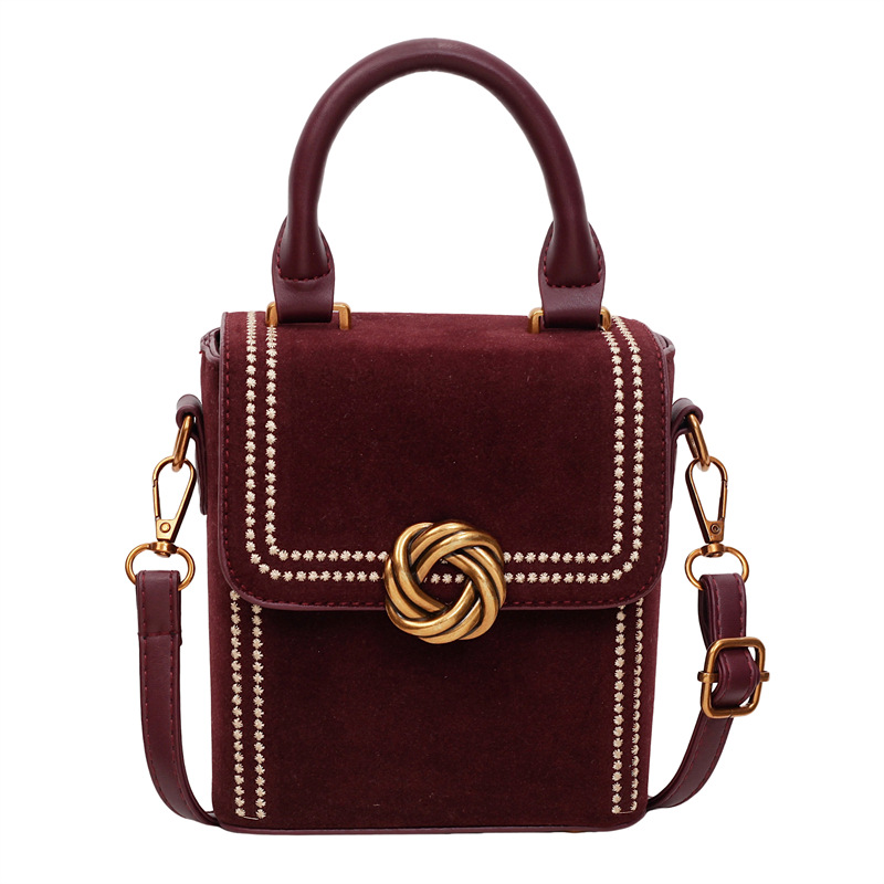 Retro alta sensación vertical bolso de mano pequeña mujer otoño / invierno 2025 nuevo estilo de moda bolso de hombro simple bolso de mochila