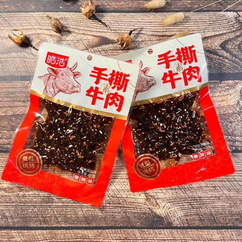 皓浩手撕素牛肉香辣辣条大包60g经典怀旧零食整箱批发皓浩牛肉粒