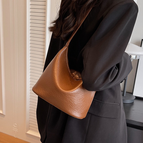This year's popular women's large-capacity 2024 new simple and versatile shoulder and crossbody bag with quality cylindrical bag