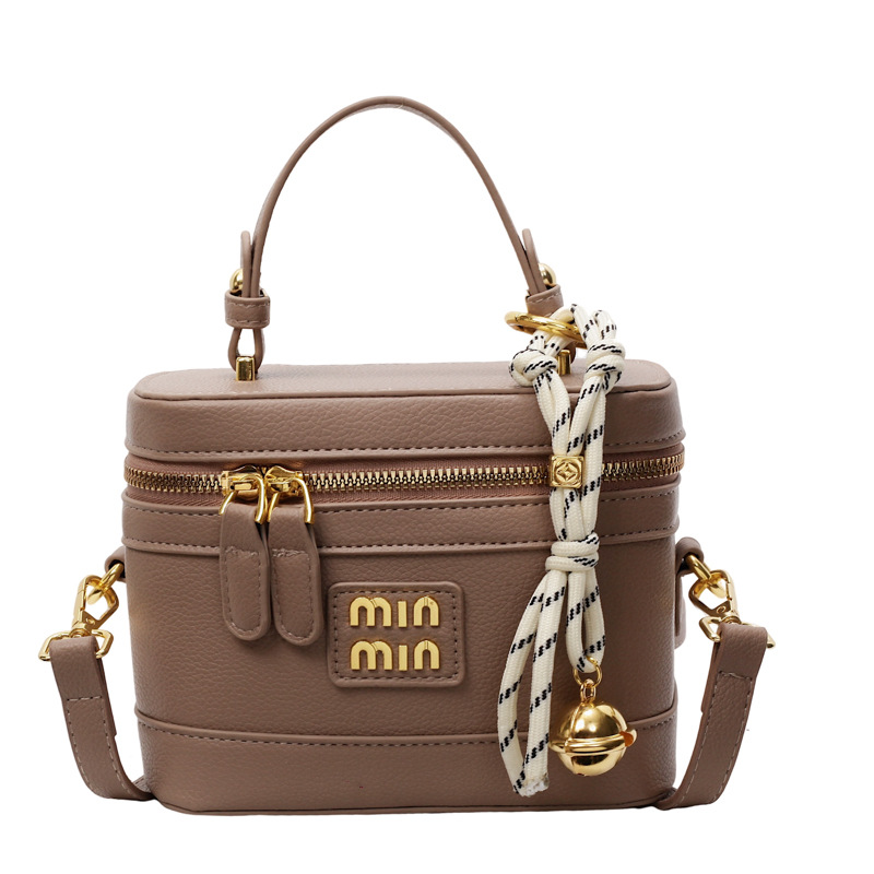 Caja portátil de alta gama transfronteriza pequeña bolsa cuadrada mujer 2025 nueva moda coreana bolso de mensajero de un solo hombro