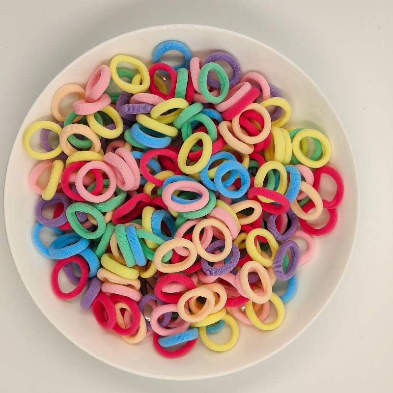 Color de caramelo de alta elasticidad pequeña toalla anillo de cabello bebé anillo de cabello no daña cabello atado fábrica de cabello al por mayor