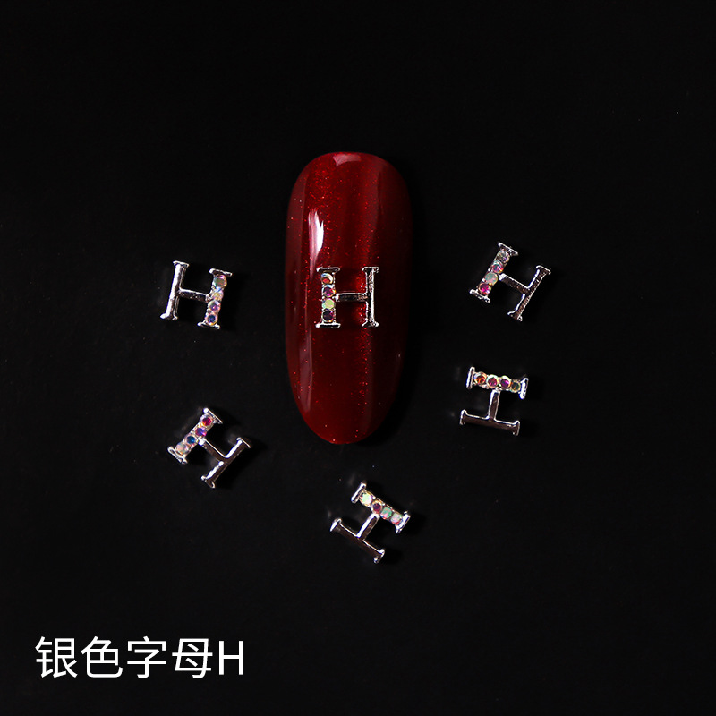Nueva LZ manicura 26 letras aleación joyería estilo japonés Internet celebridad plata letras manicura joyería clavo Taladro