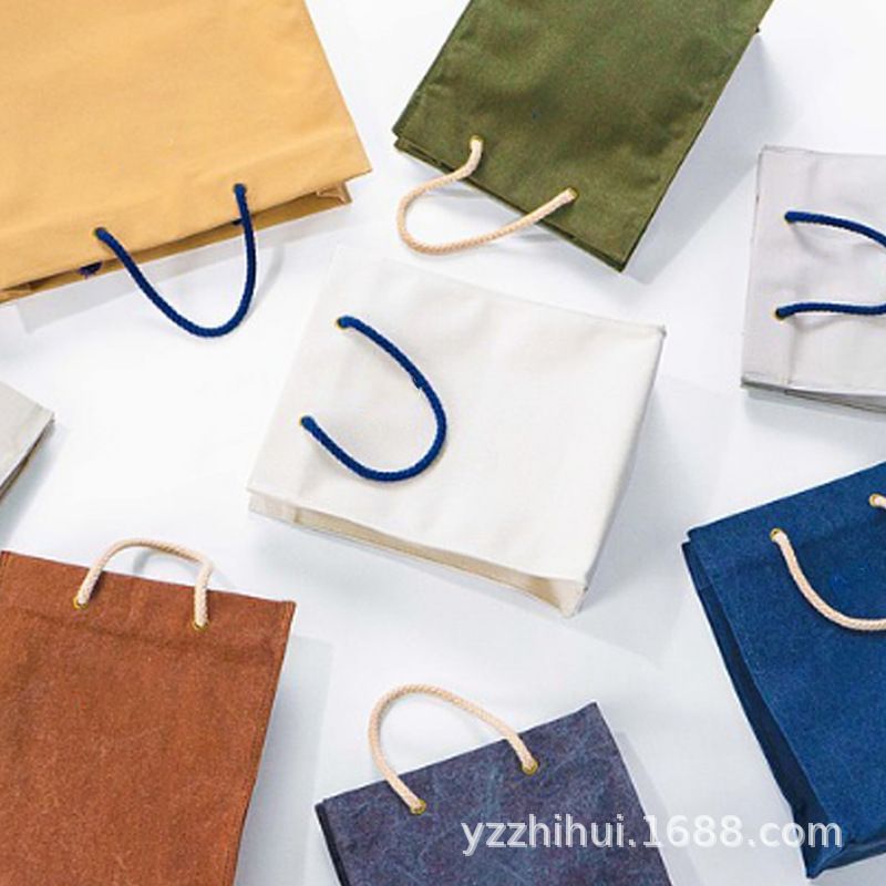 现代简约帆布手提带 学生单肩购物帆布包 手机数据线收纳袋