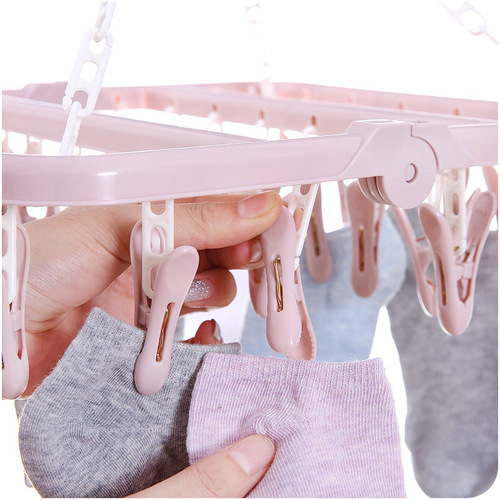 32 clips 0 folding clothes hanger adult windproof clothes drying rack household plastic children's socks clothes drying rack wholesale