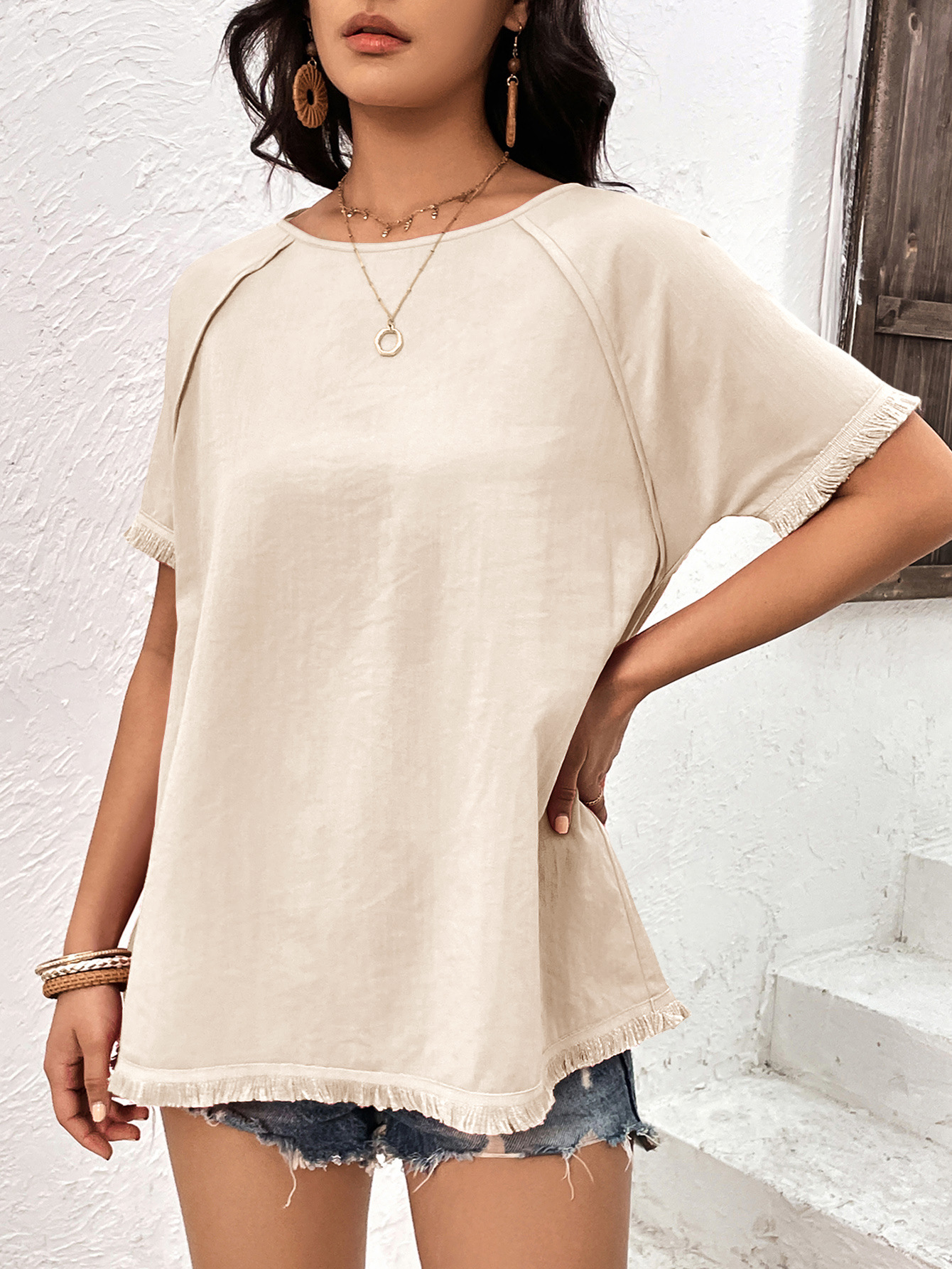 Top casual ampio con scollo tondo e frange da donna_voghion.com