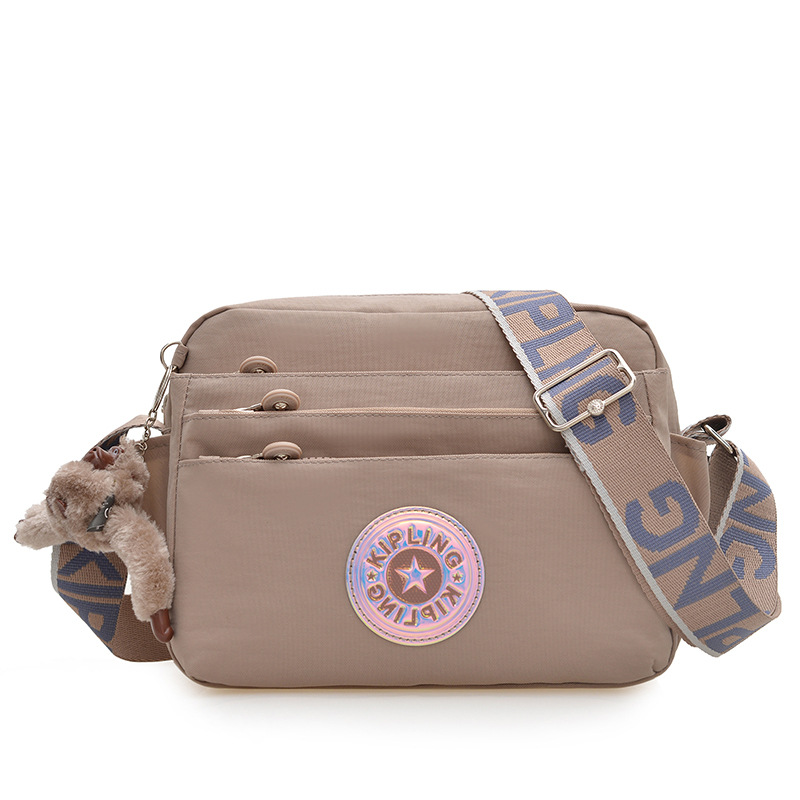 Nuevo bolso de hombro para mujer kp bolso de mensajero de tela de nailon anti-salpicaduras ultraligero nuevo colgante de mono estándar damas compras diagonales