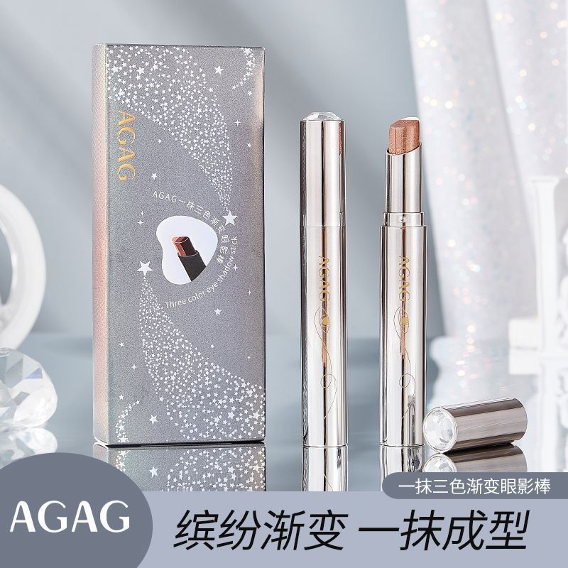 AGAG three-color gradient eyeshadow stick with shimmering fine glitter in earthy tones, perfect for lazy beginners to apply in one stroke for long-lasting makeup
