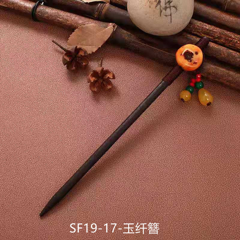 黒檀の木のかんざしのフリンジをまねて、かんざしの子供の古風な頭飾りをします。|undefined