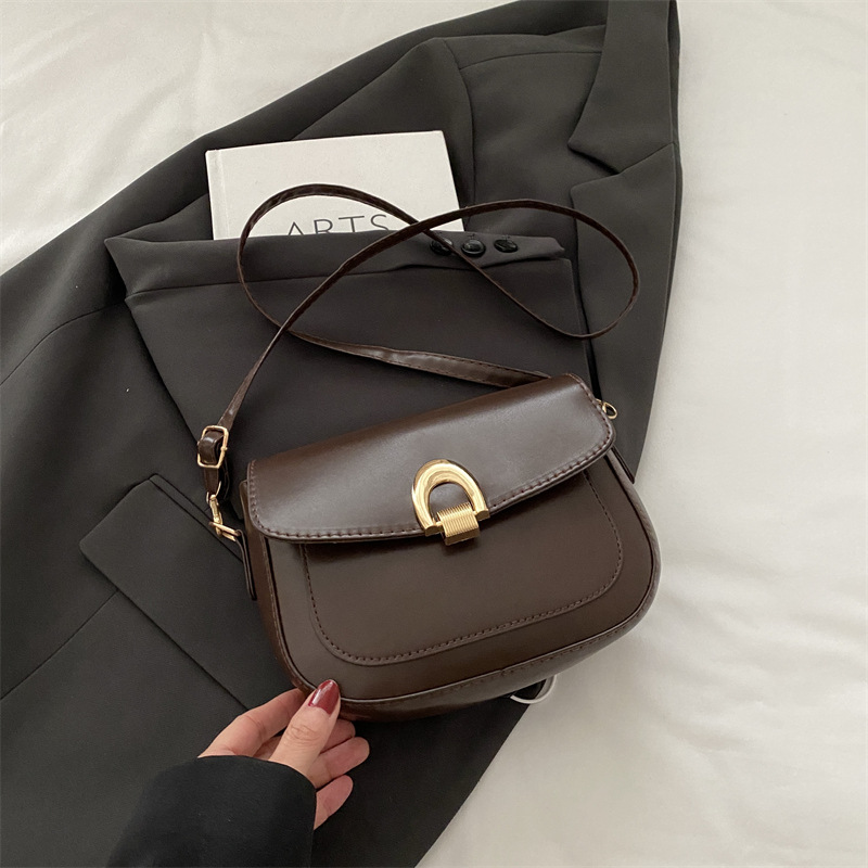 A principios de la primavera de 2025, bolsos de silla de moda casuales coreanos, bolsos de mujer de alta calidad.