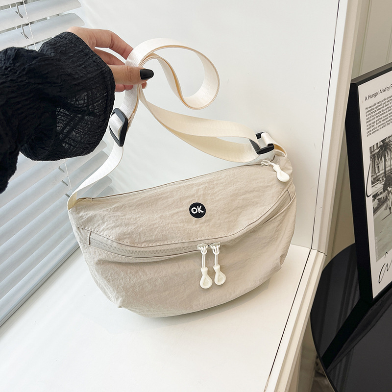 Ultra-light Oxford cloth saddle bag, simple waterproof crossbody bag, versatile and lightweight for men and women, suitable for commuting and travel