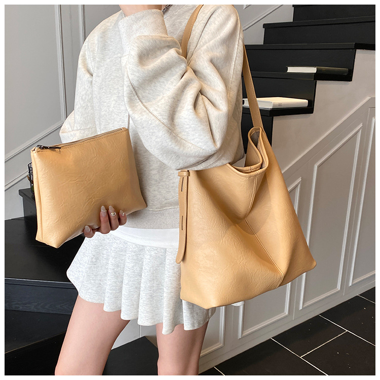 Korean style, retro, large-capacity tote bag for women, new summer 2025, versatile, fashionable, simple and solid color crossbody bag undefined