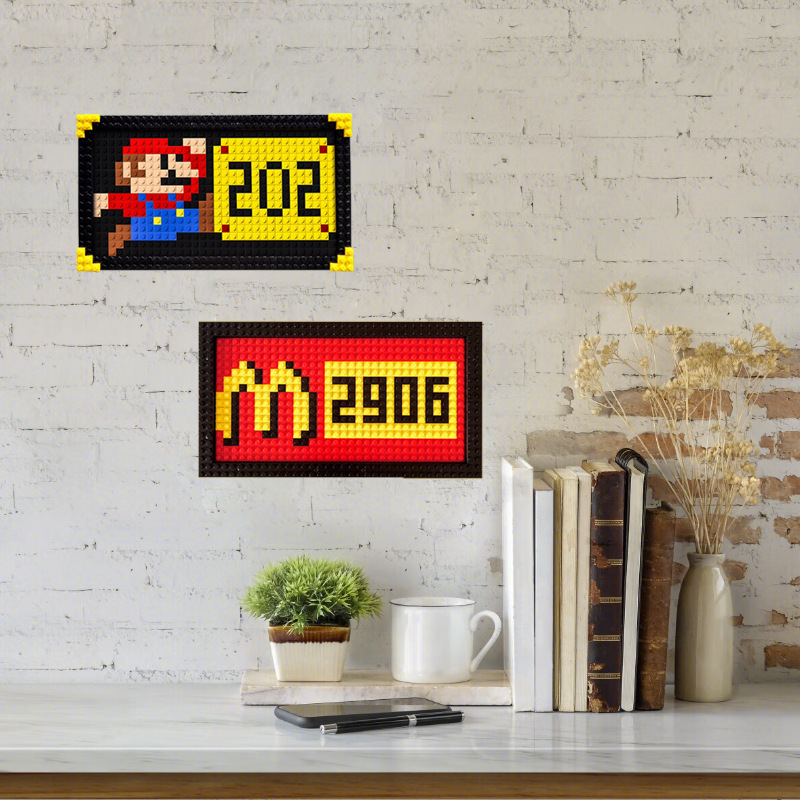 マリオの積み木の立体の額縁の表札のスーパーメアリーの指示札は戸口に入って装飾してピクセルの絵の札をつづり合わせます。|undefined